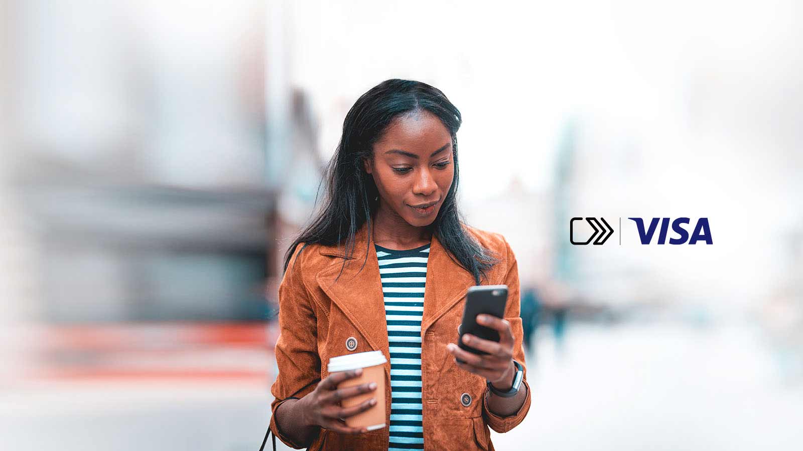 A woman uses her phone while holding a cup of coffee with the new online checkout logo positioned on the right side of the image.