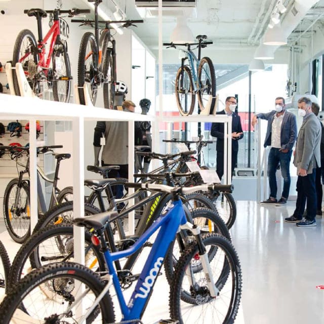 Light shop interior with a variety of bicycles