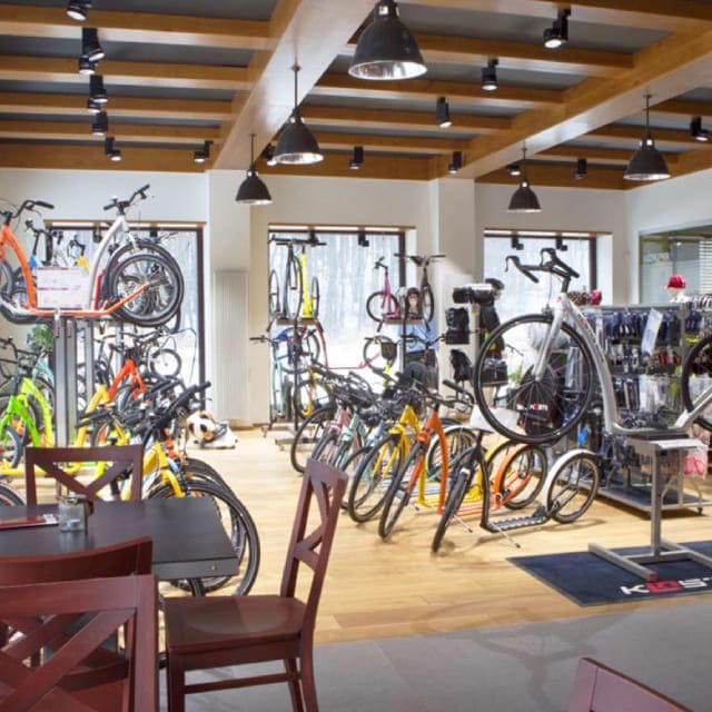 The modern interior of the Kostka Kolobka shop with its various bicycles