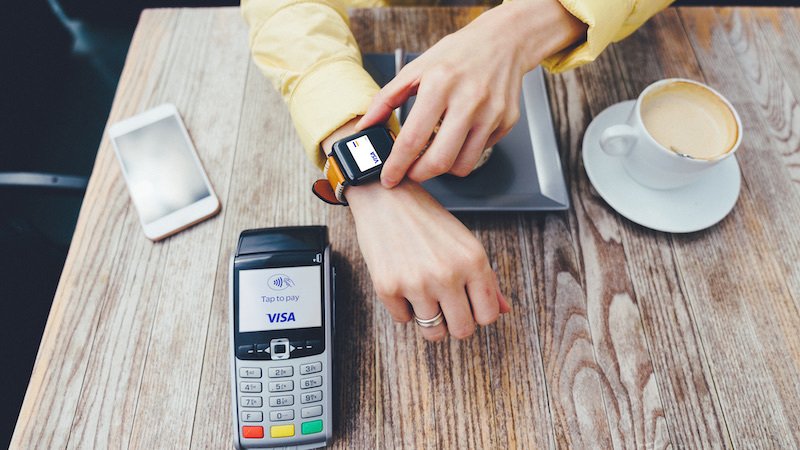 watch payment on coffee table