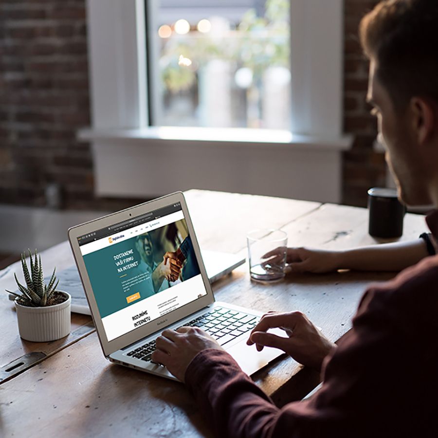 man using laptop